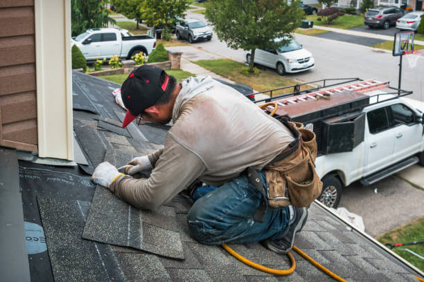 Professional Emergency Roof Repair technician working in Williamsburg, PA